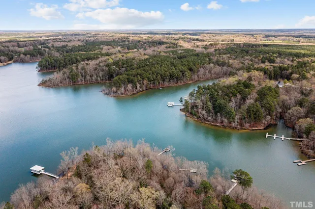 a view of a lake with mountains in background