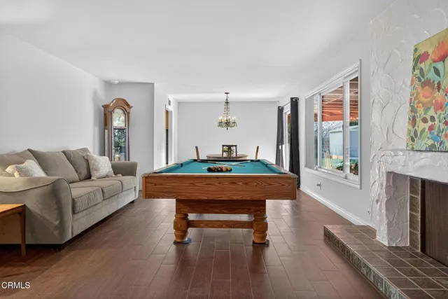 a living room with furniture and a table