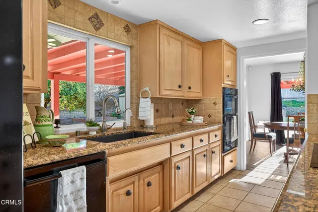 a view of a dining table and chairs in the room