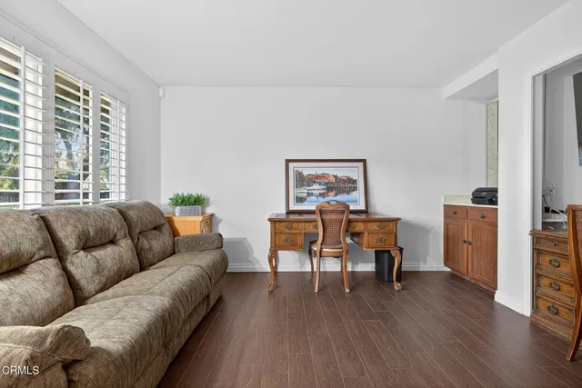 a bathroom with a double vanity sink and a bathtub