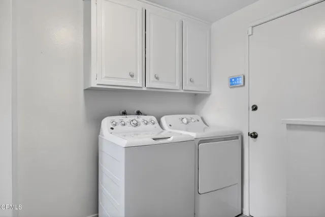 a swimming pool with lots of green space