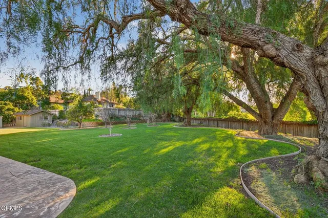 an aerial view of a house with a garden
