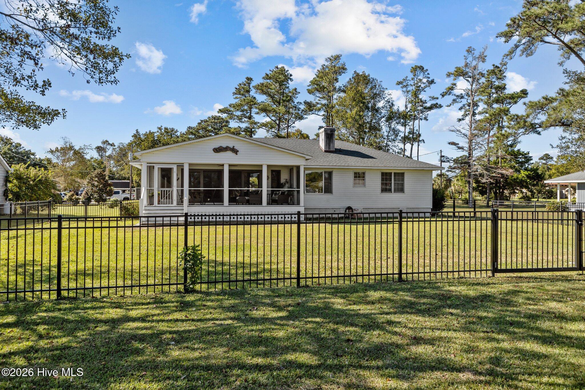 180 Wallace Road Beaufort, NC 28516 - Photo 6 of 45 Great outdoor living on newly installed screened in porch