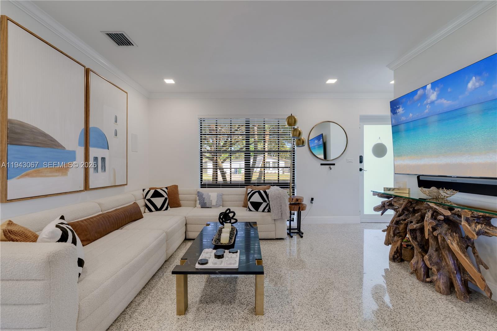 16102 Southwest 98th Avenue Miami, FL 33157 - Photo 13 of 36 Bright, welcoming living room space designed for comfort and effortless everyday living.