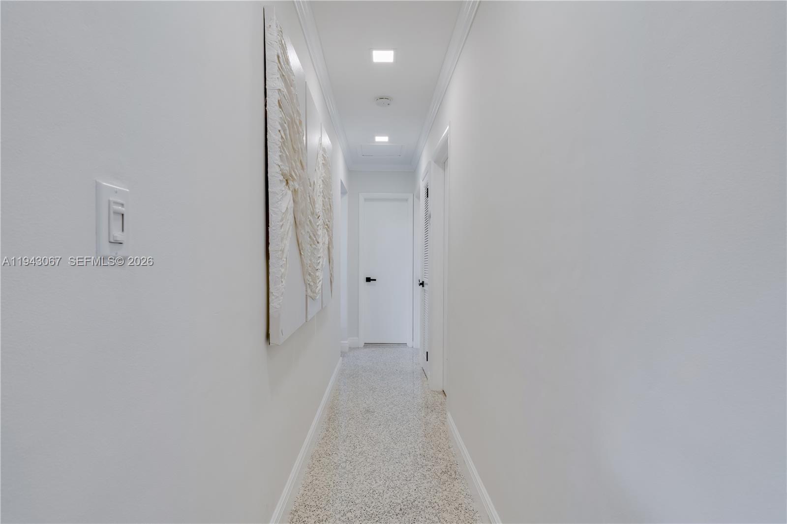 16102 Southwest 98th Avenue Miami, FL 33157 - Photo 29 of 36 Hallway, light, bright and adorned with crown molding
