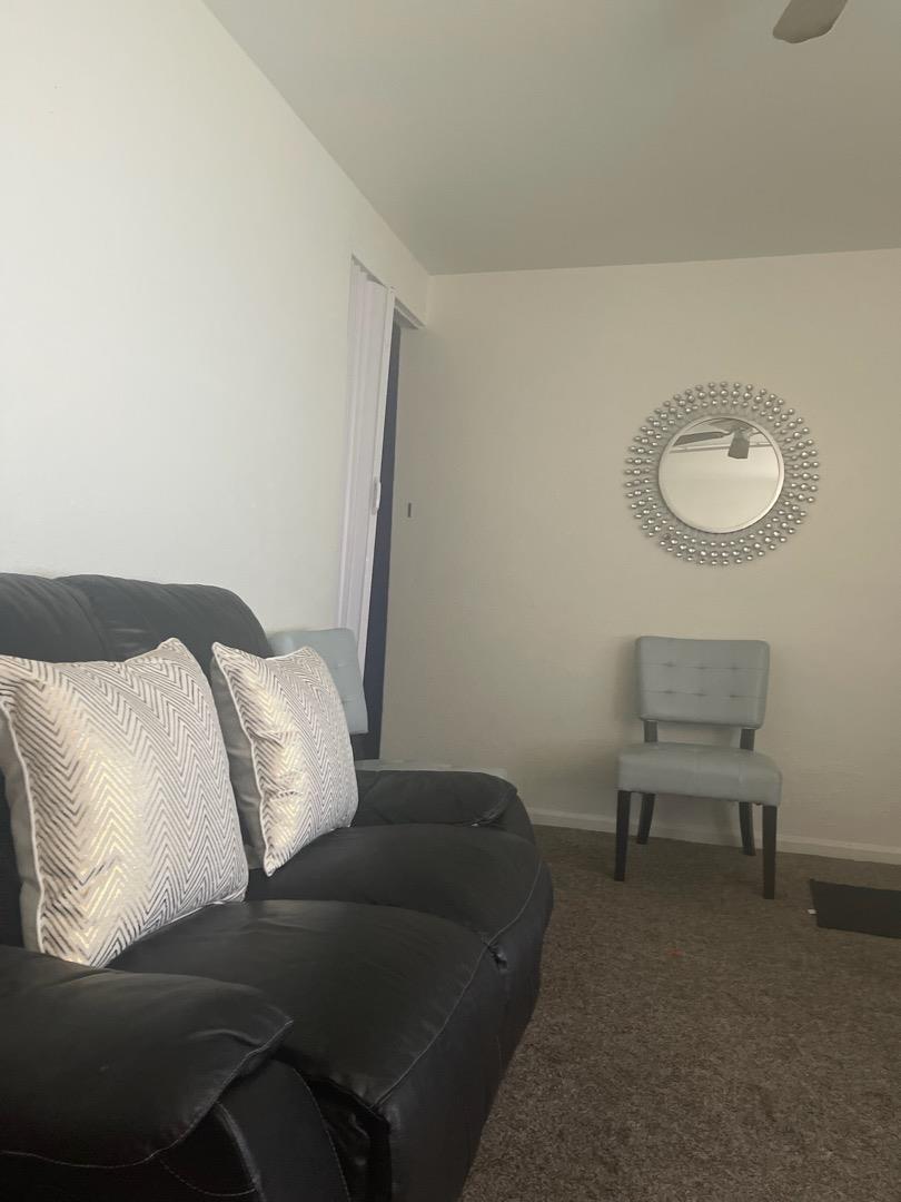 2863 Crest Road Atwater, CA 95301 - Photo 3 of 4 a living room with a couch