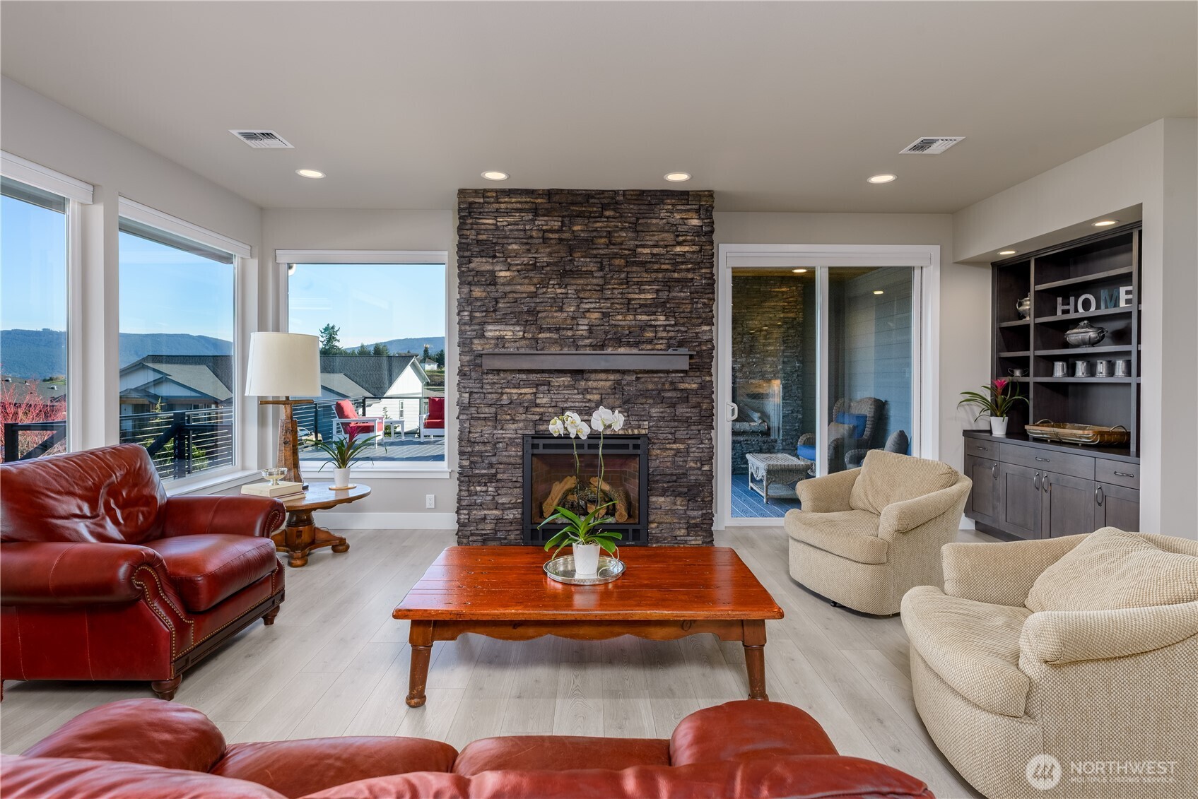 621 Jones Farm Road Sequim, WA 98382 - Photo 8 of 40 a living room with fireplace furniture and a large window
