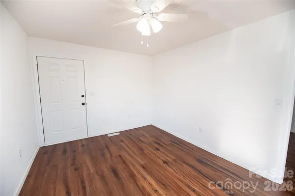 wooden floor in a hall with an entryway