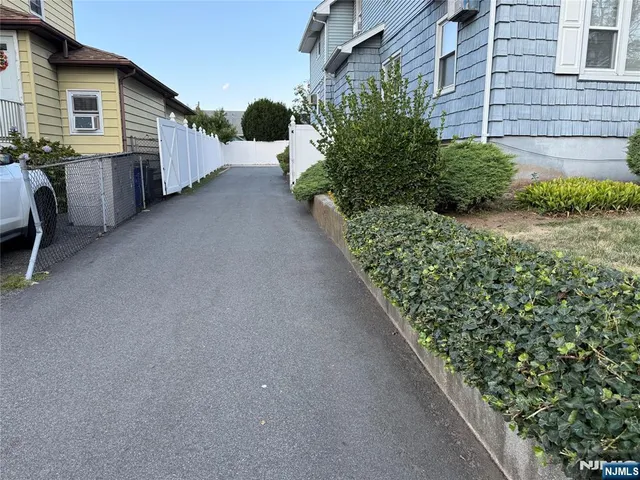 a view of a backyard with plants