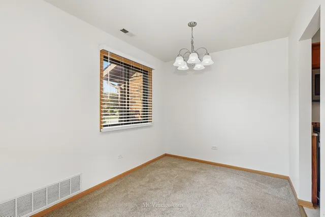 en empty room with windows