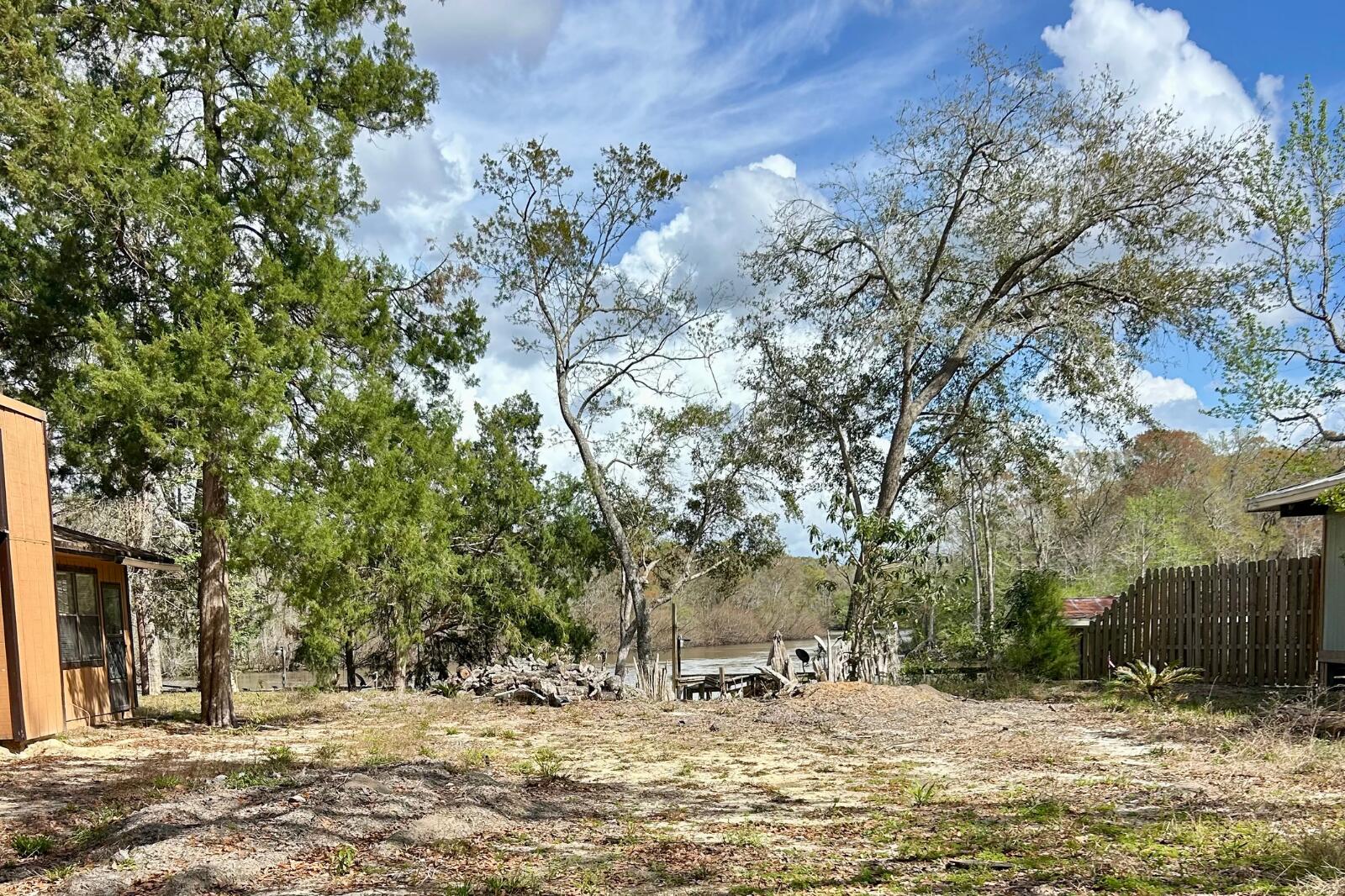 338 Howell Bluff Road Ponce de Leon, FL 32455 - Photo 8 of 8 a view of a lake with a tree