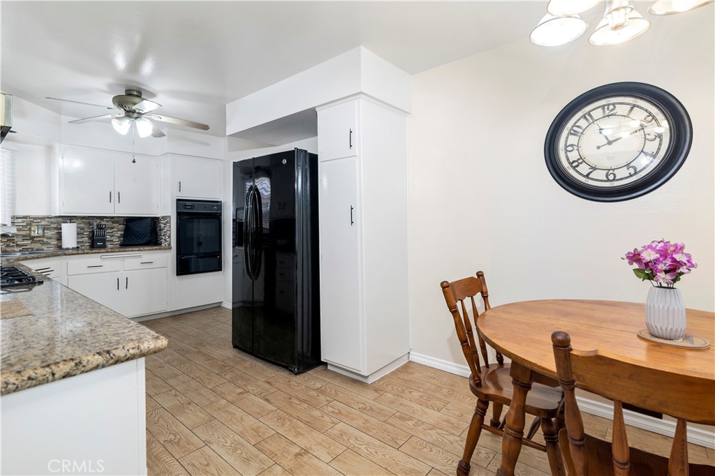 10409 Pendleton Street Riverside, CA 92505 - Photo 14 of 35 a view of a dining room with furniture