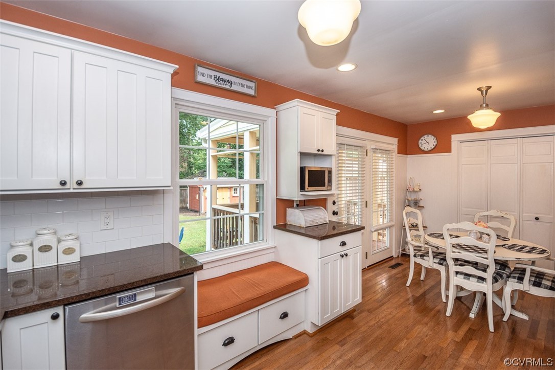 4648 Brookridge Road Chesterfield, VA 23832 - Photo 23 of 50 a kitchen that has a lot of cabinets in it and wooden floors