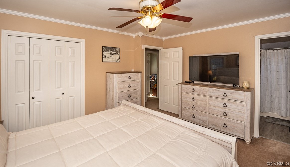 4648 Brookridge Road Chesterfield, VA 23832 - Photo 30 of 50 a bedroom with a bed and a flat screen tv