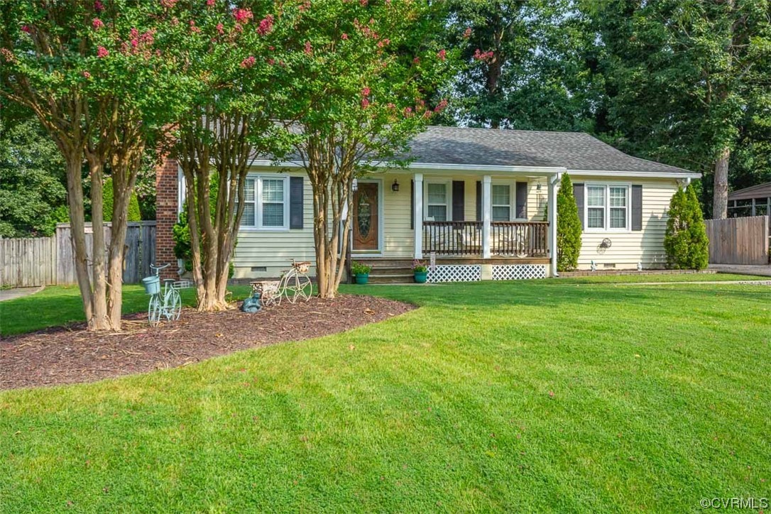 4648 Brookridge Road Chesterfield, VA 23832 - Photo 3 of 50 a front view of a house with a garden and porch