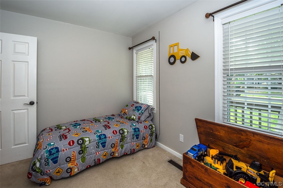 4648 Brookridge Road Chesterfield, VA 23832 - Photo 34 of 50 a bed room with two beds and a window