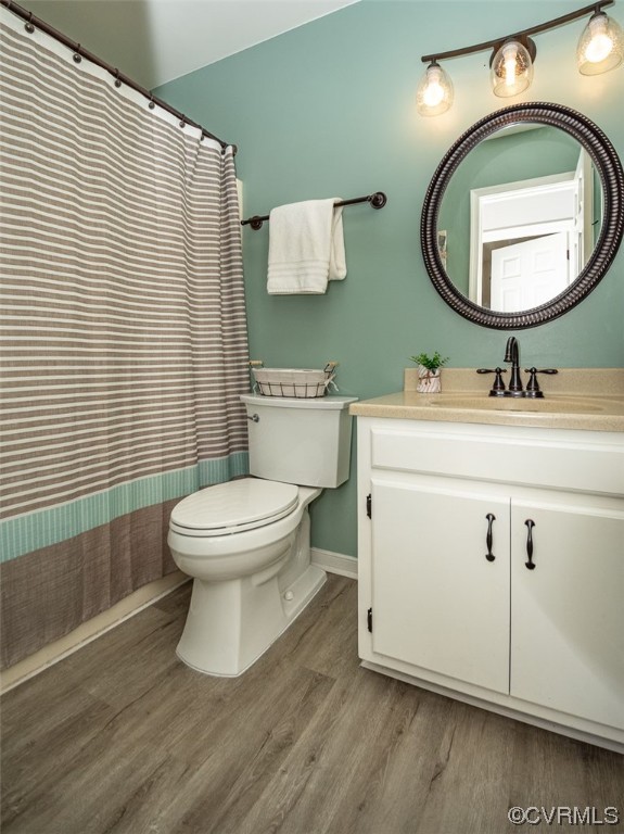 4648 Brookridge Road Chesterfield, VA 23832 - Photo 36 of 50 a bathroom with a toilet a sink and mirror