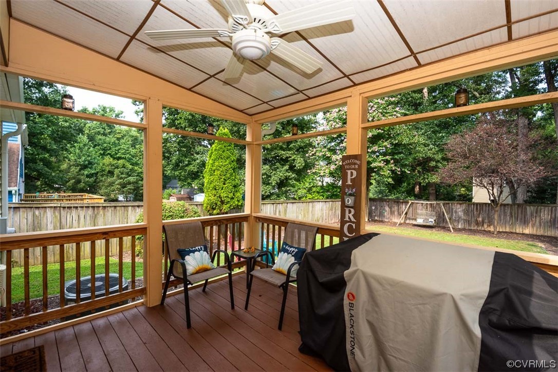 4648 Brookridge Road Chesterfield, VA 23832 - Photo 39 of 50 a view of a patio with a table chairs and wooden floor
