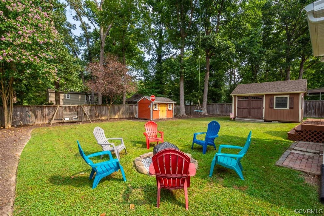4648 Brookridge Road Chesterfield, VA 23832 - Photo 48 of 50 a view of a chairs in backyard of the house