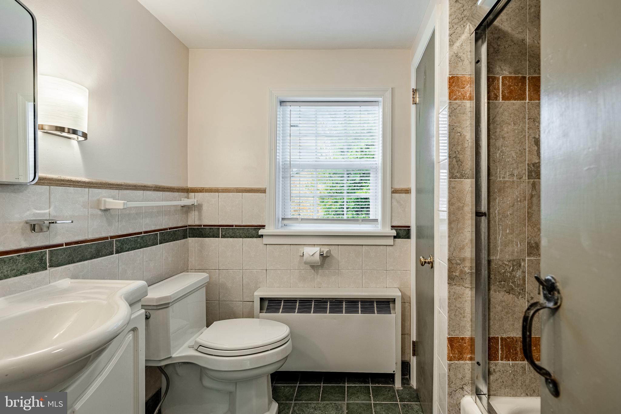 59 East Main Street Elverson, PA 19520 - Photo 29 of 43 a bathroom with a sink toilet and shower