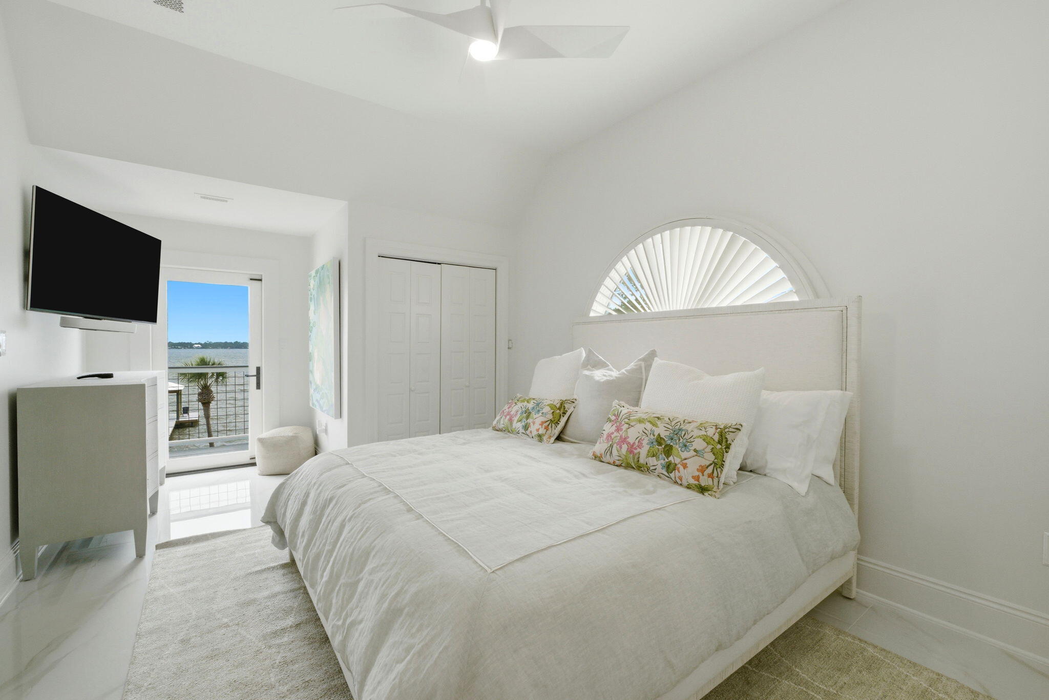 31061 Peninsula Drive Orange Beach, AL 36561 - Photo 14 of 93 a bedroom with a bed and a flat screen tv