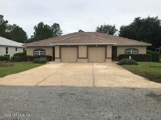 34 Raintree Place, Unit A Palm Coast, FL 32164 - Photo 1 of 18 Front