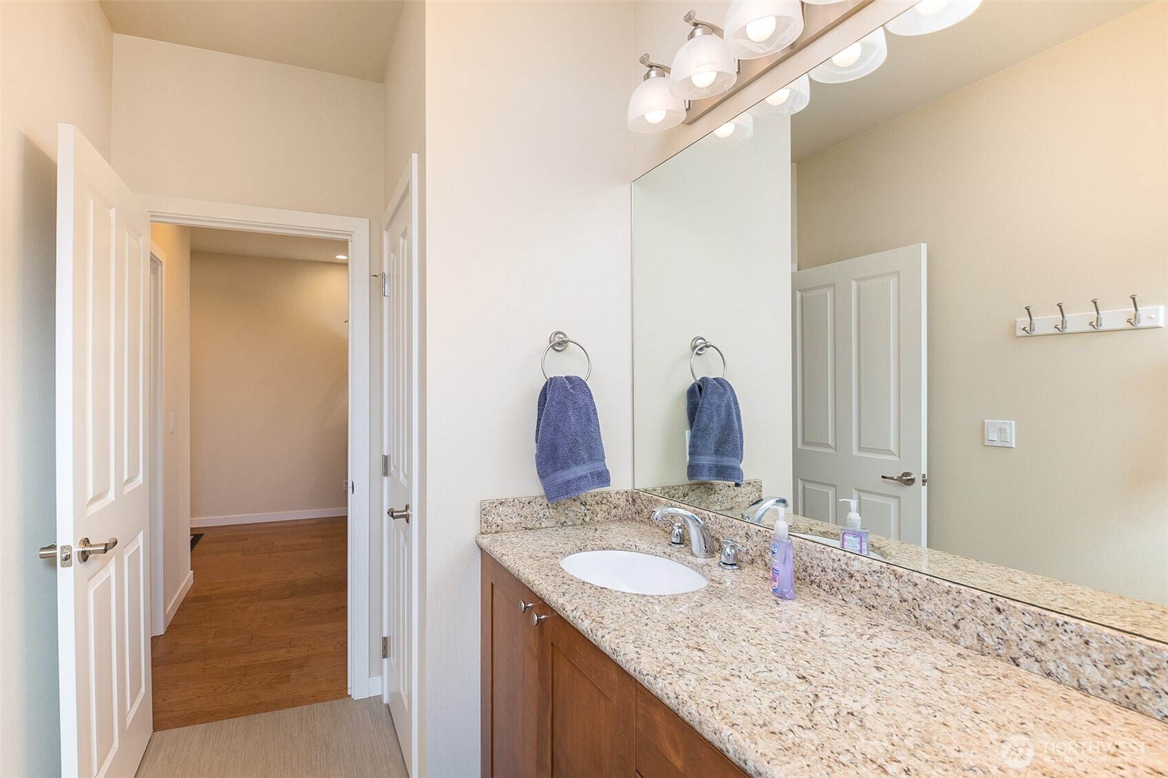 271 Blue Glacier Loop Sequim, WA 98382 - Photo 11 of 39 a bathroom with a granite countertop sink and a mirror