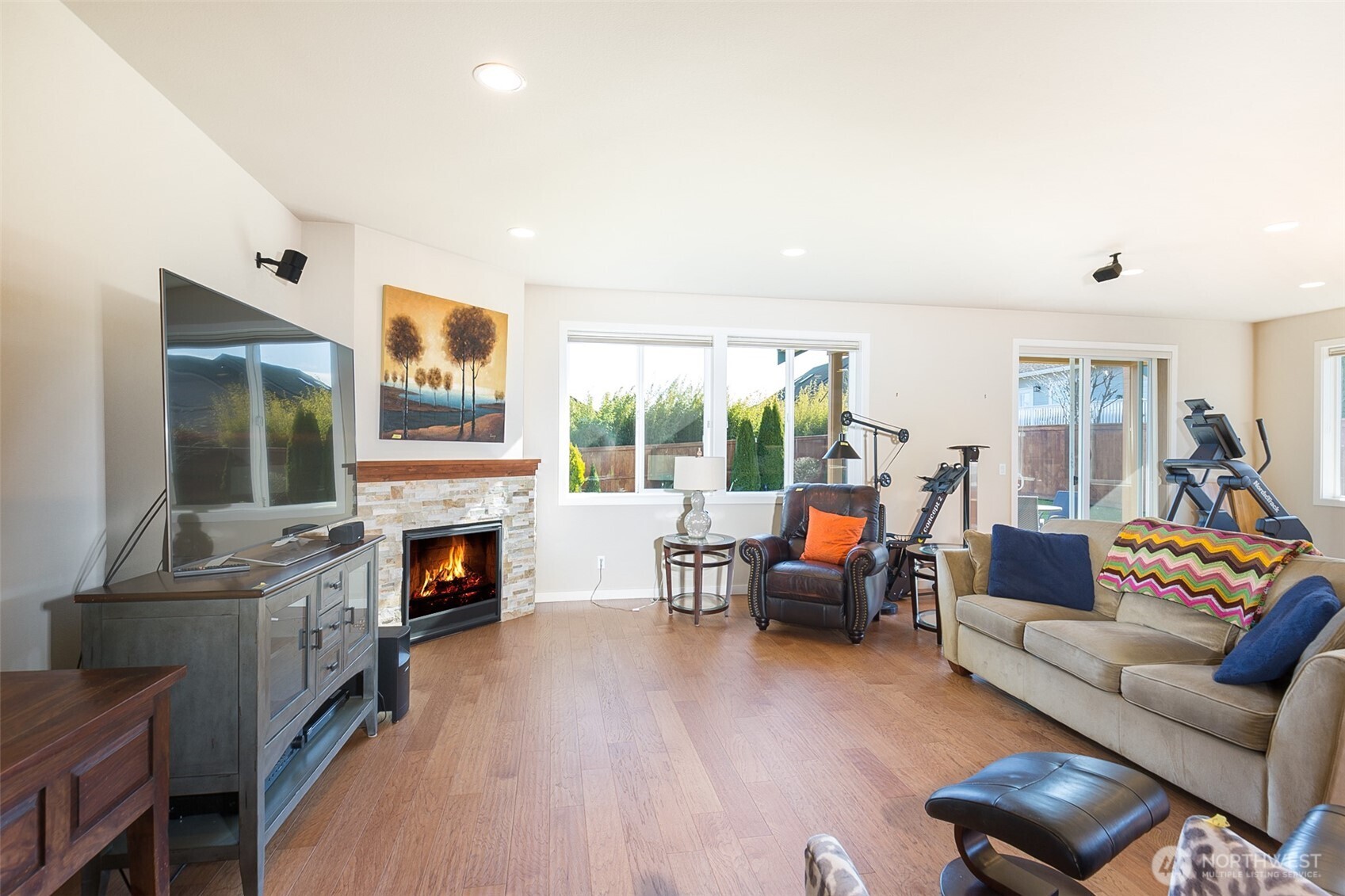 271 Blue Glacier Loop Sequim, WA 98382 - Photo 13 of 39 a living room with furniture and a fireplace