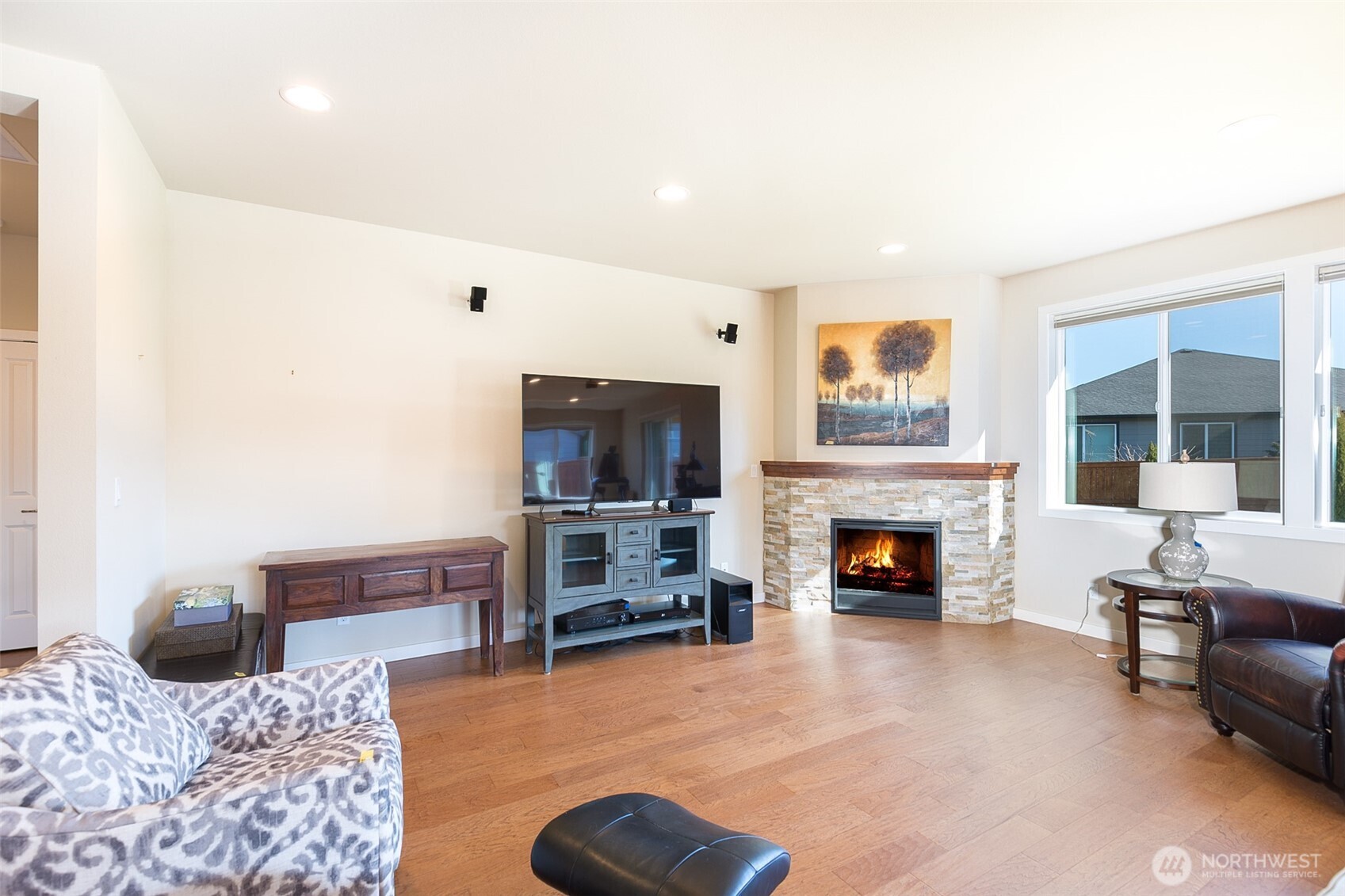 271 Blue Glacier Loop Sequim, WA 98382 - Photo 15 of 39 a living room with furniture and a fireplace