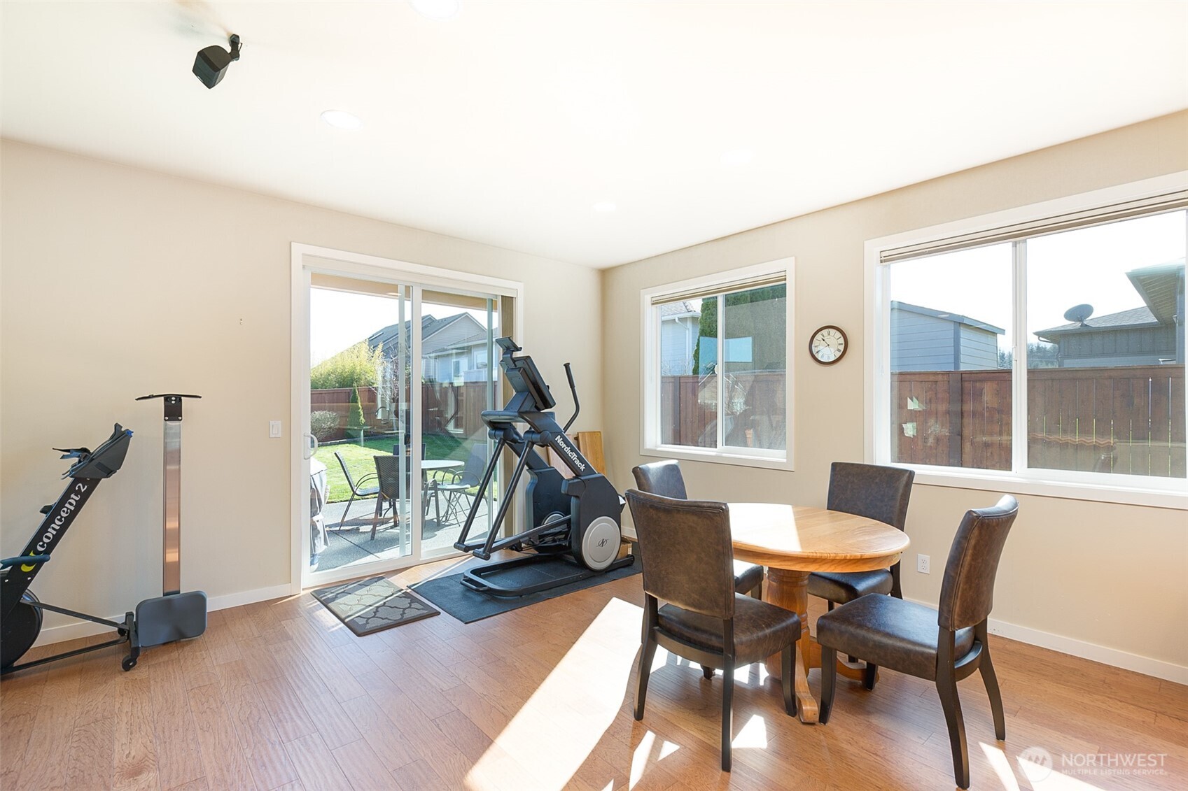 271 Blue Glacier Loop Sequim, WA 98382 - Photo 16 of 39 a view of a dining room with furniture window and wooden floor