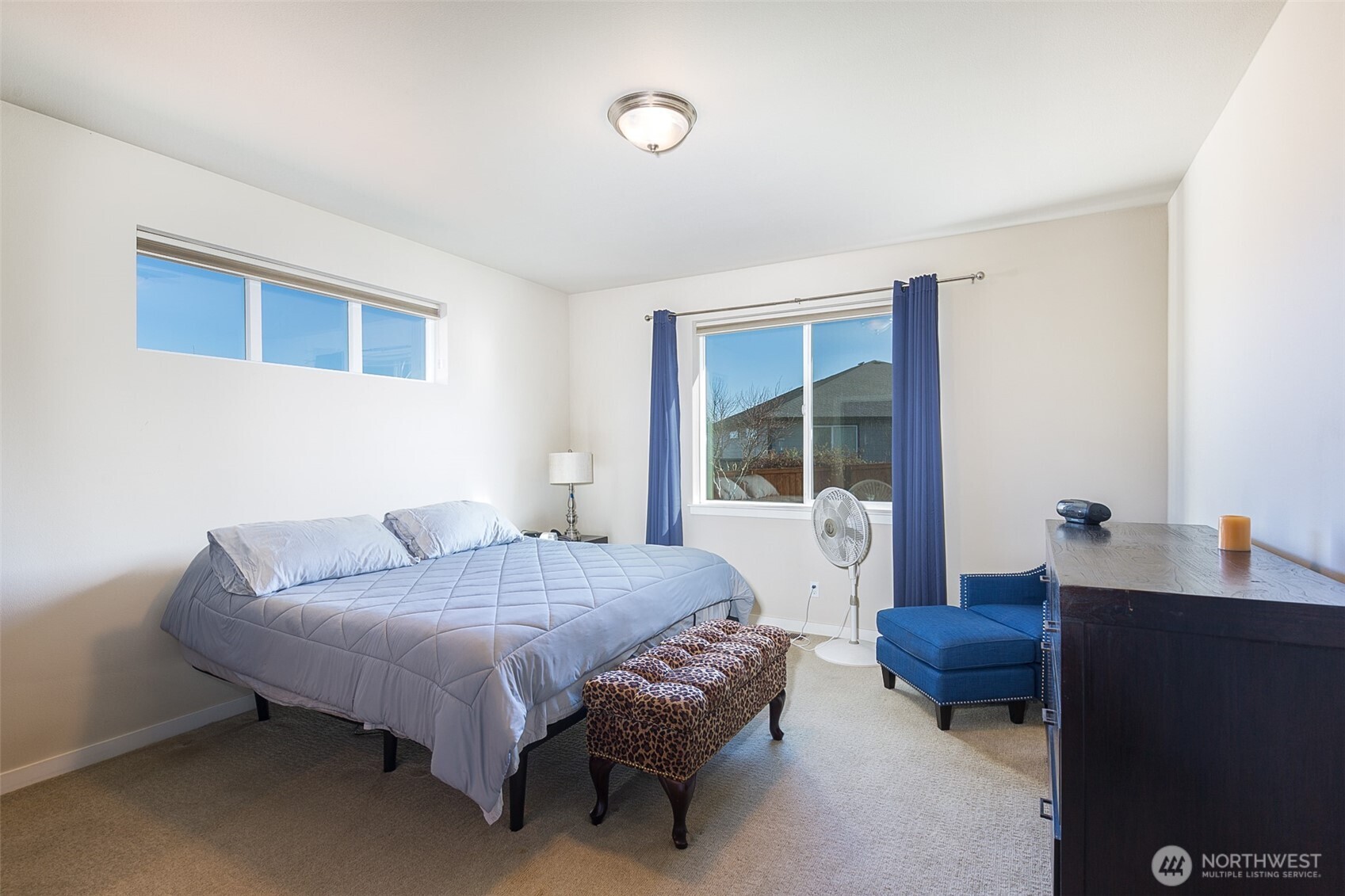 271 Blue Glacier Loop Sequim, WA 98382 - Photo 22 of 39 a bedroom with a bed and a window