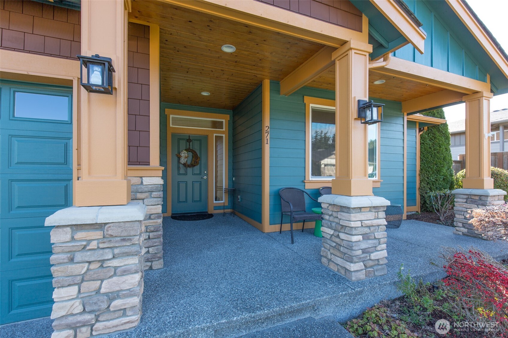 271 Blue Glacier Loop Sequim, WA 98382 - Photo 4 of 39 a view of front door of house with outdoor seating