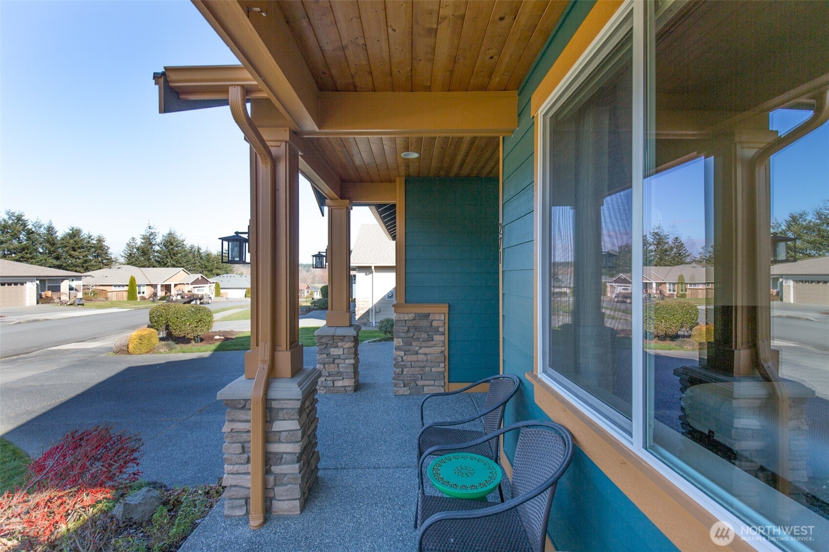 271 Blue Glacier Loop Sequim, WA 98382 - Photo 5 of 39 a outdoor space with patio the couches and a potted plant on a table