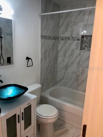 a view of a large yard with large trees