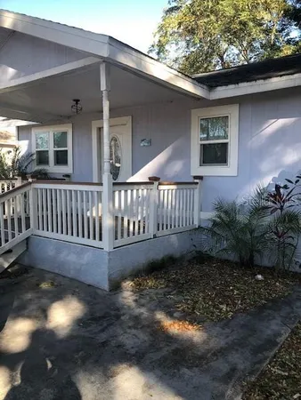a view of a deck with a yard