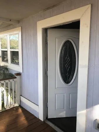 a close view of a utility room with dryer and washer