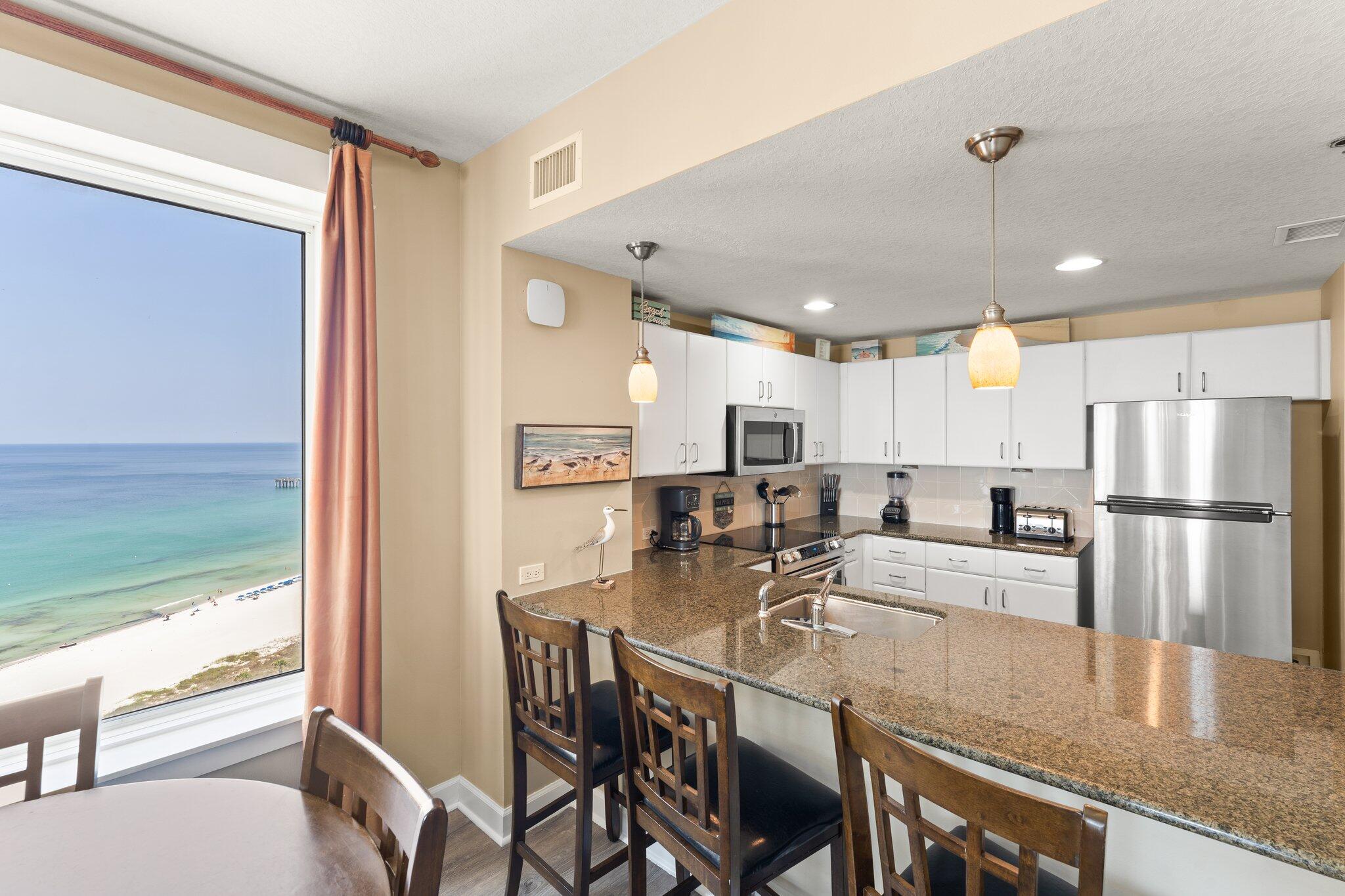 11800 Front Beach Road, Unit 1301 Panama City Beach, FL 32407 - Photo 8 of 41 Kitchen Breakfast bar