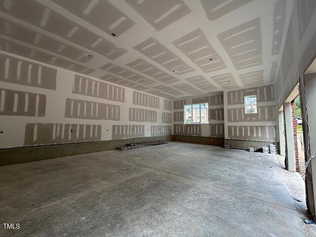 1500 Ridge Road Raleigh, NC 27607 - Photo 20 of 36 a view of an empty room with windows