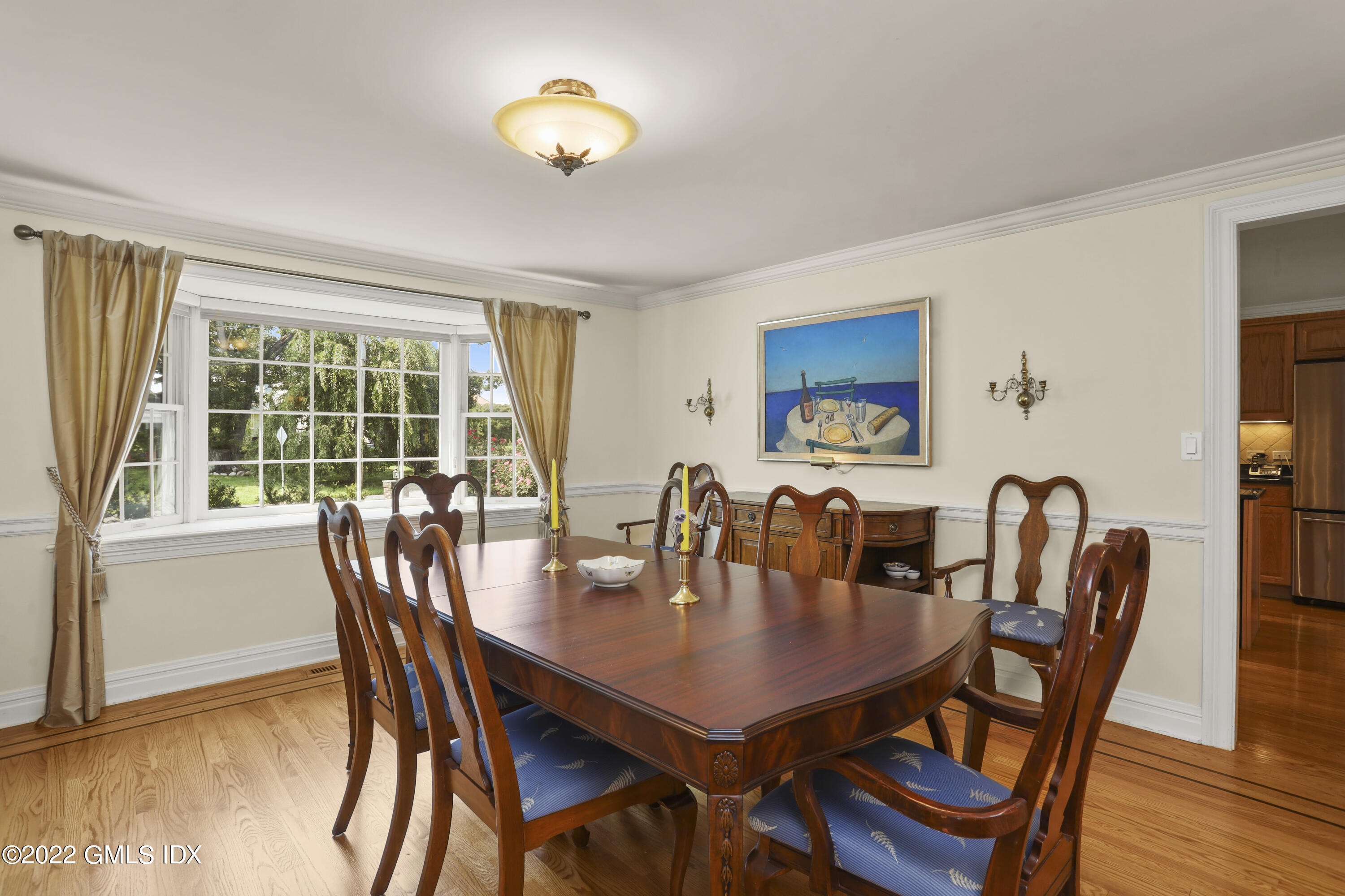 90 Carter Drive Stamford, CT 06902 - Photo 11 of 40 a view of a dining room with furniture and wooden floor