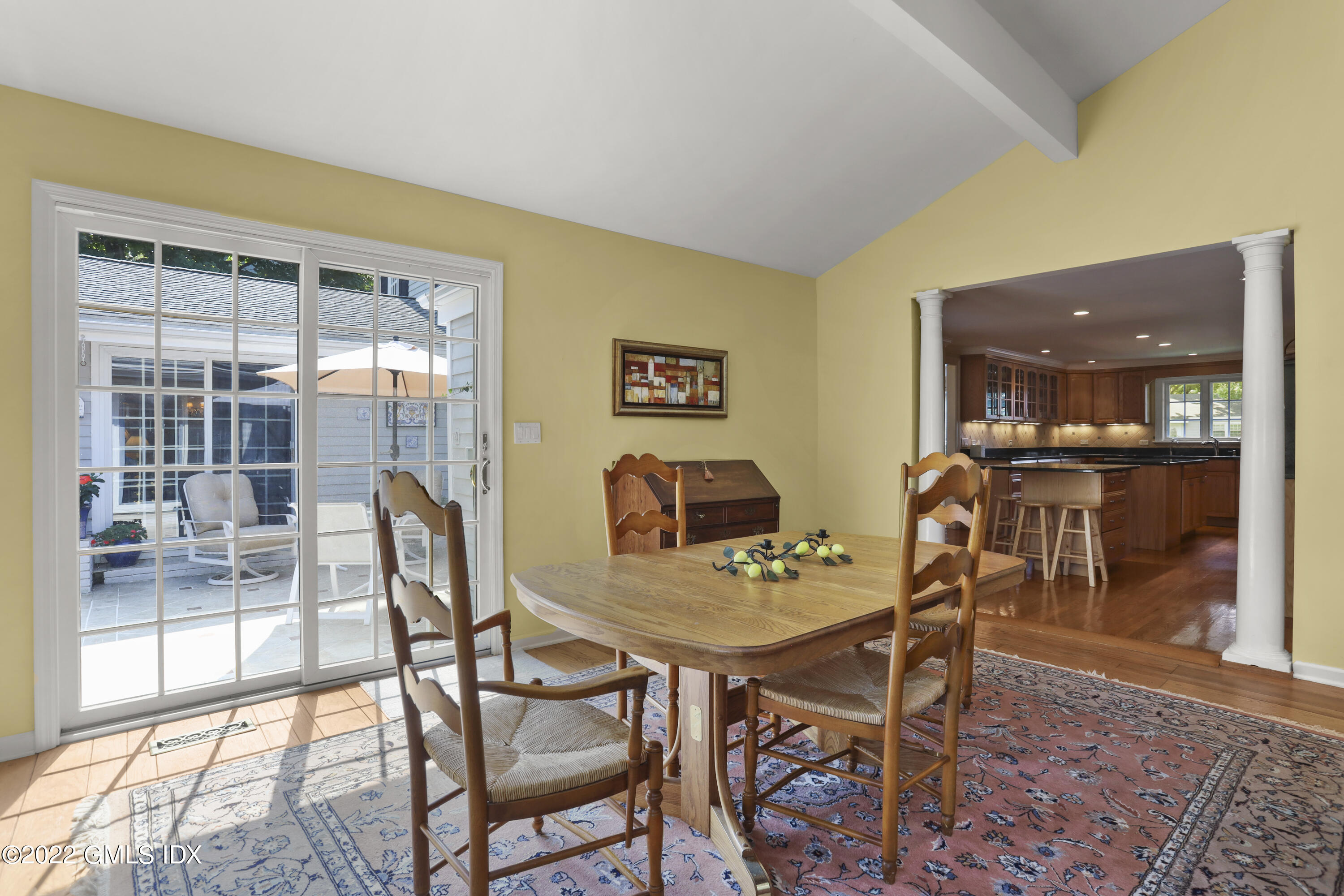 90 Carter Drive Stamford, CT 06902 - Photo 15 of 40 a view of a dining room with furniture and wooden floor