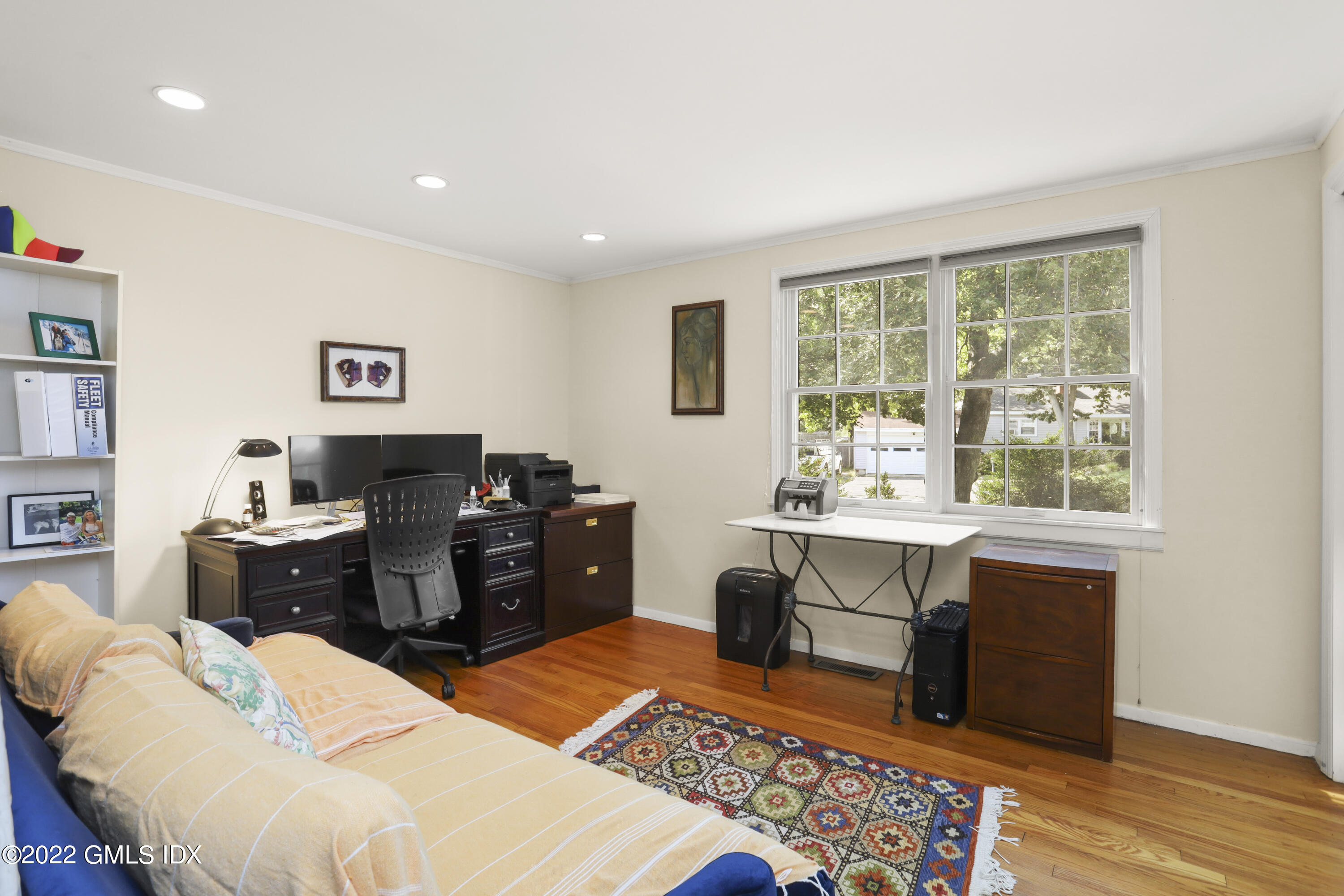 90 Carter Drive Stamford, CT 06902 - Photo 20 of 40 a bed room with a bed and furniture