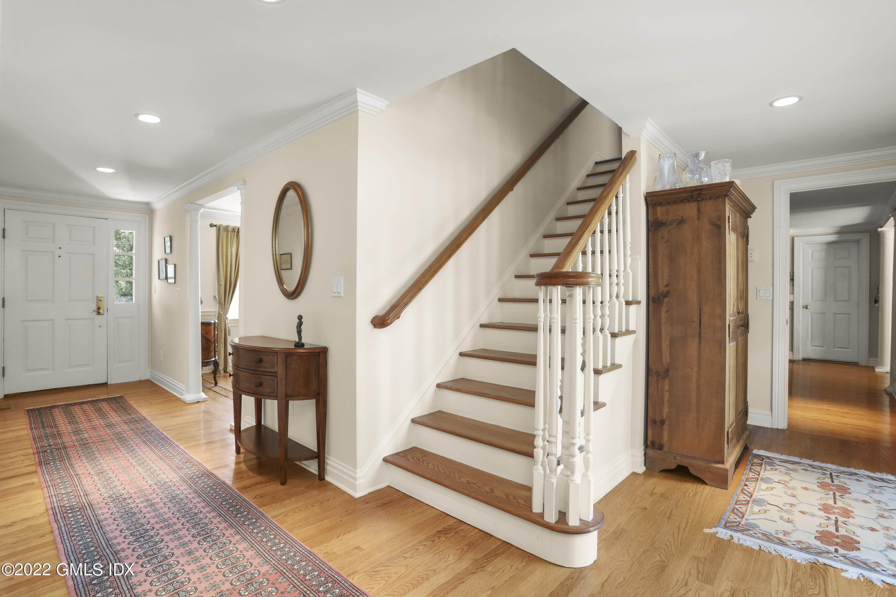 90 Carter Drive Stamford, CT 06902 - Photo 25 of 40 a view of entryway and hall with wooden floor
