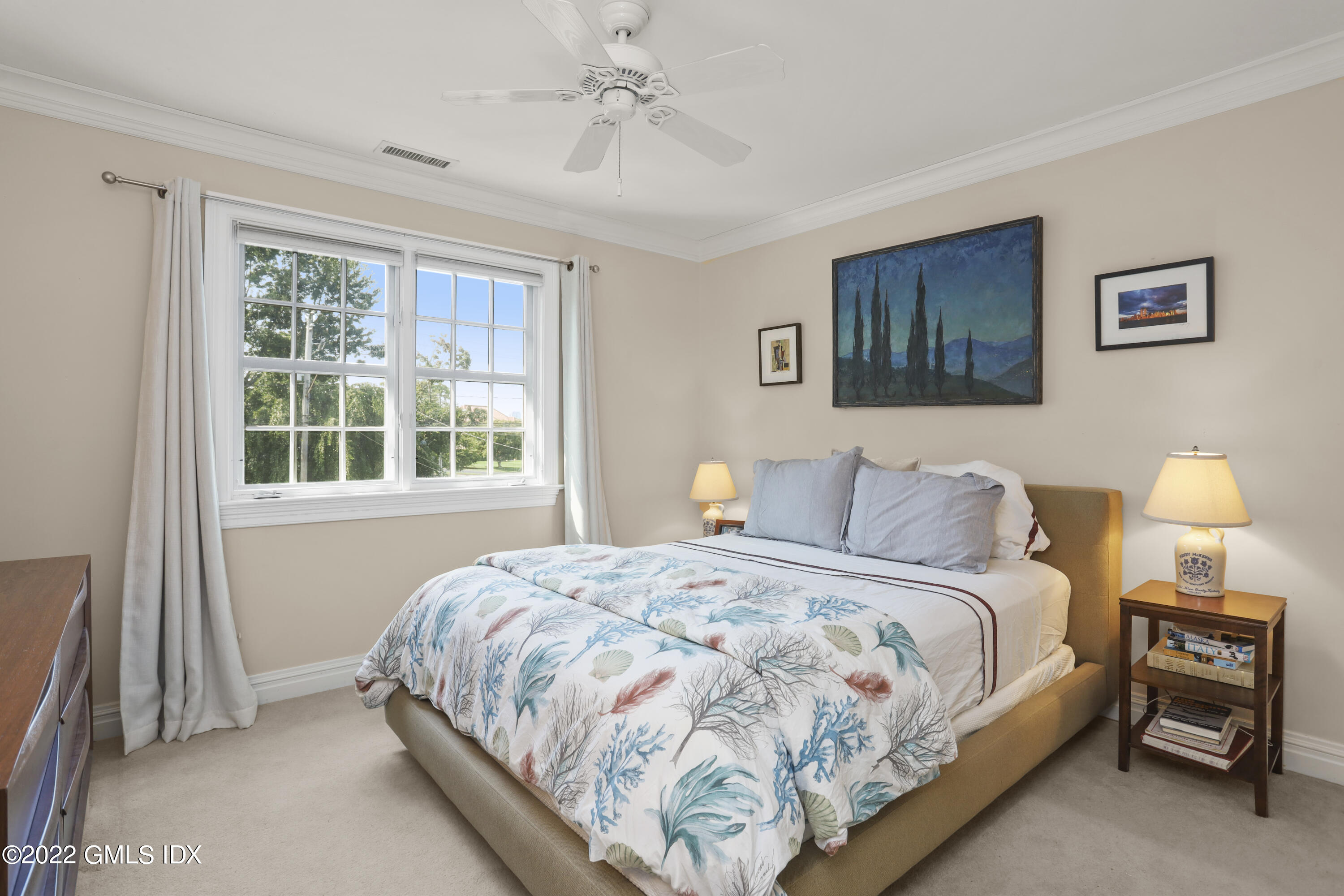 90 Carter Drive Stamford, CT 06902 - Photo 26 of 40 a bedroom with a bed and a window