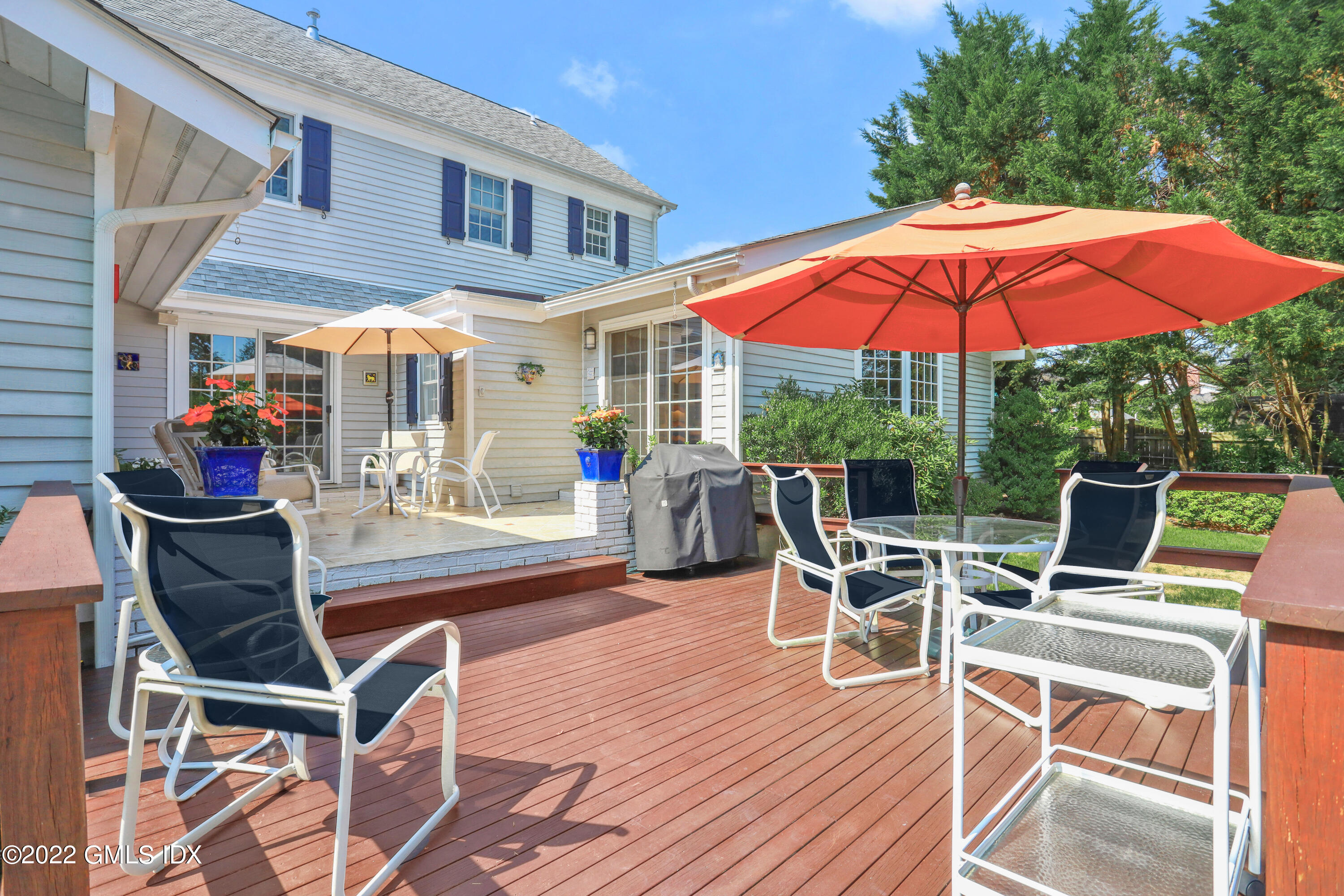 90 Carter Drive Stamford, CT 06902 - Photo 3 of 40 a view of a chairs and table in the patio