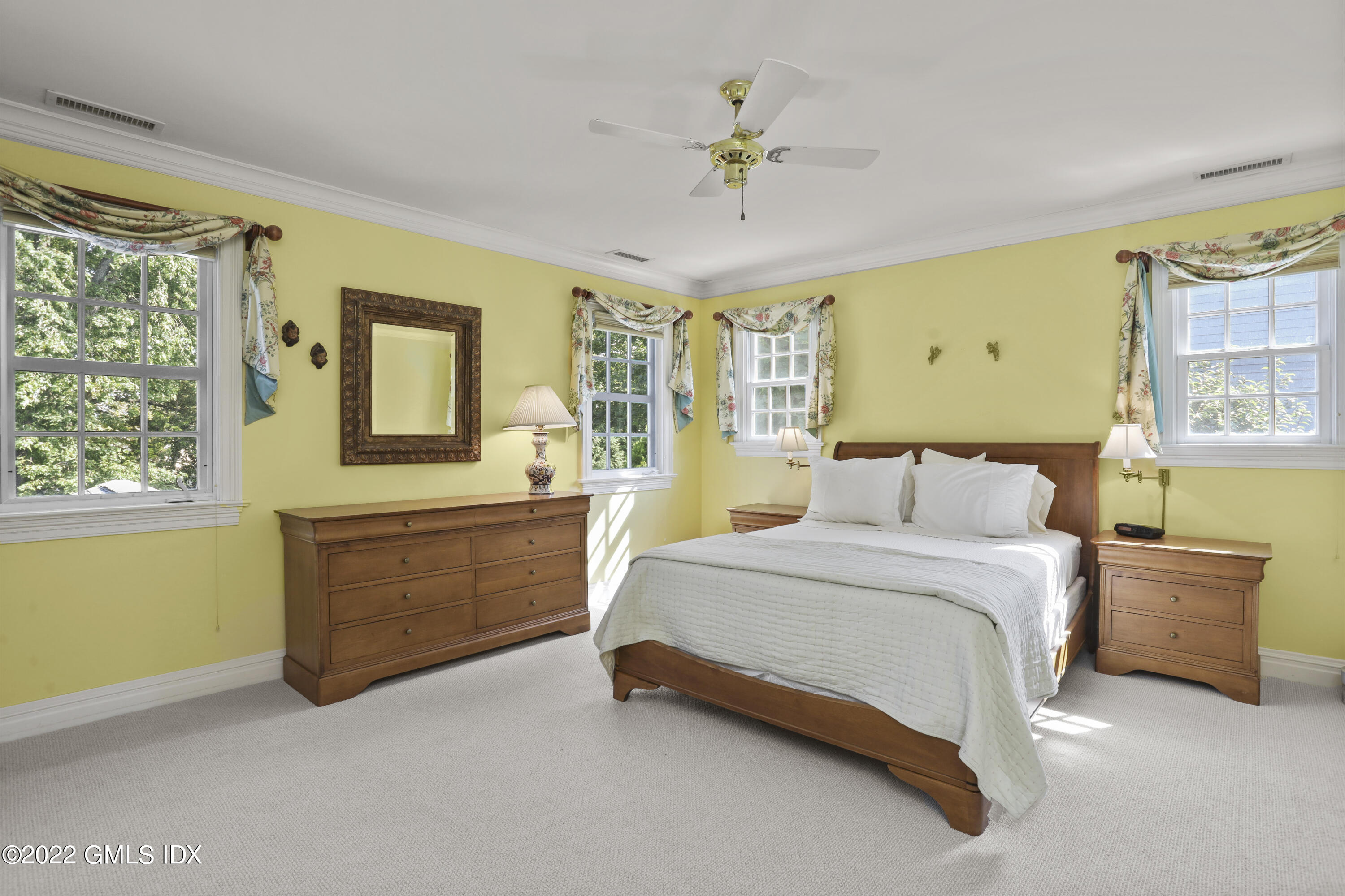 90 Carter Drive Stamford, CT 06902 - Photo 31 of 40 a spacious bedroom with a bed and window