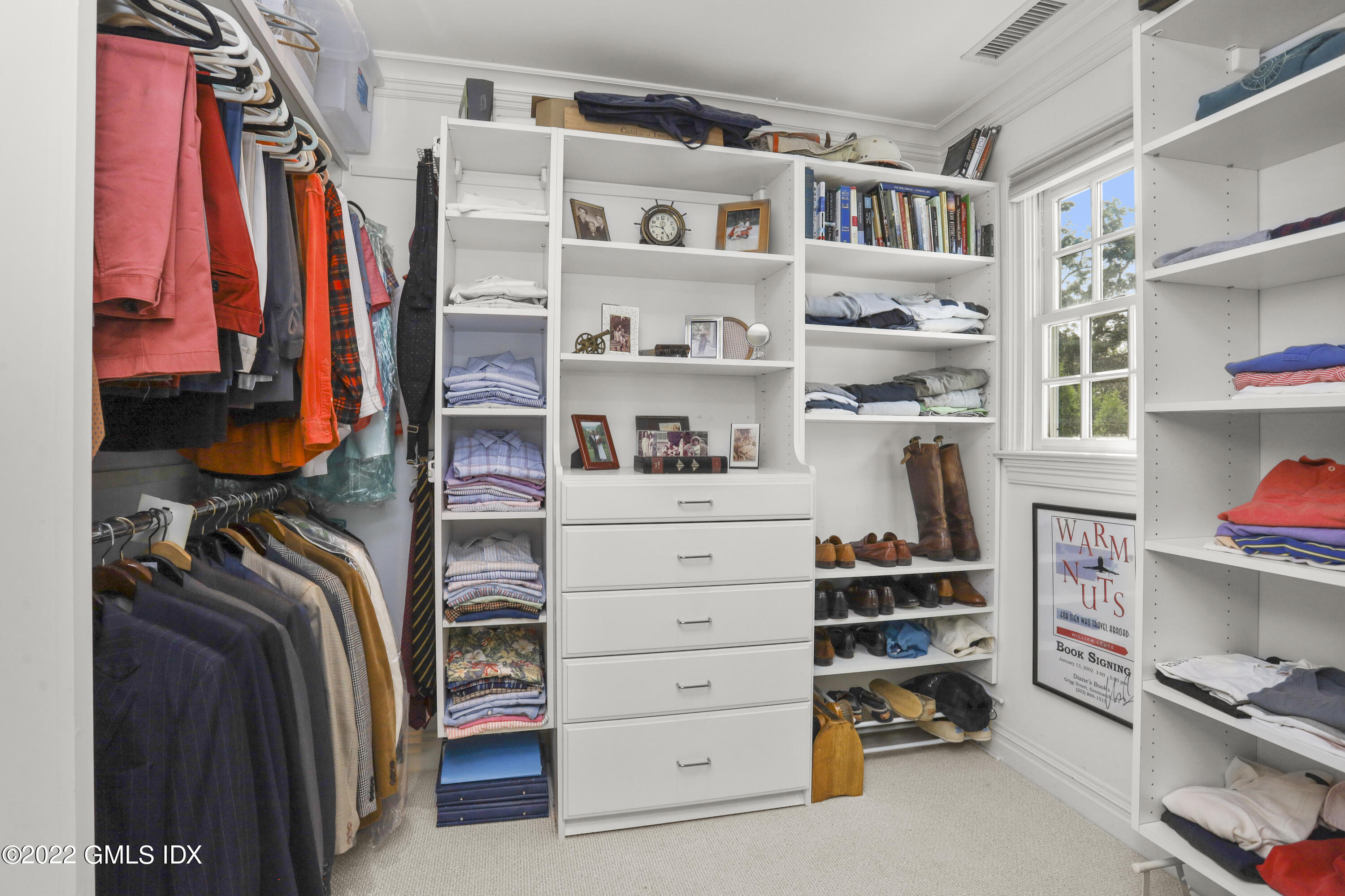 90 Carter Drive Stamford, CT 06902 - Photo 34 of 40 a view of walk in closet with clothes and shoes