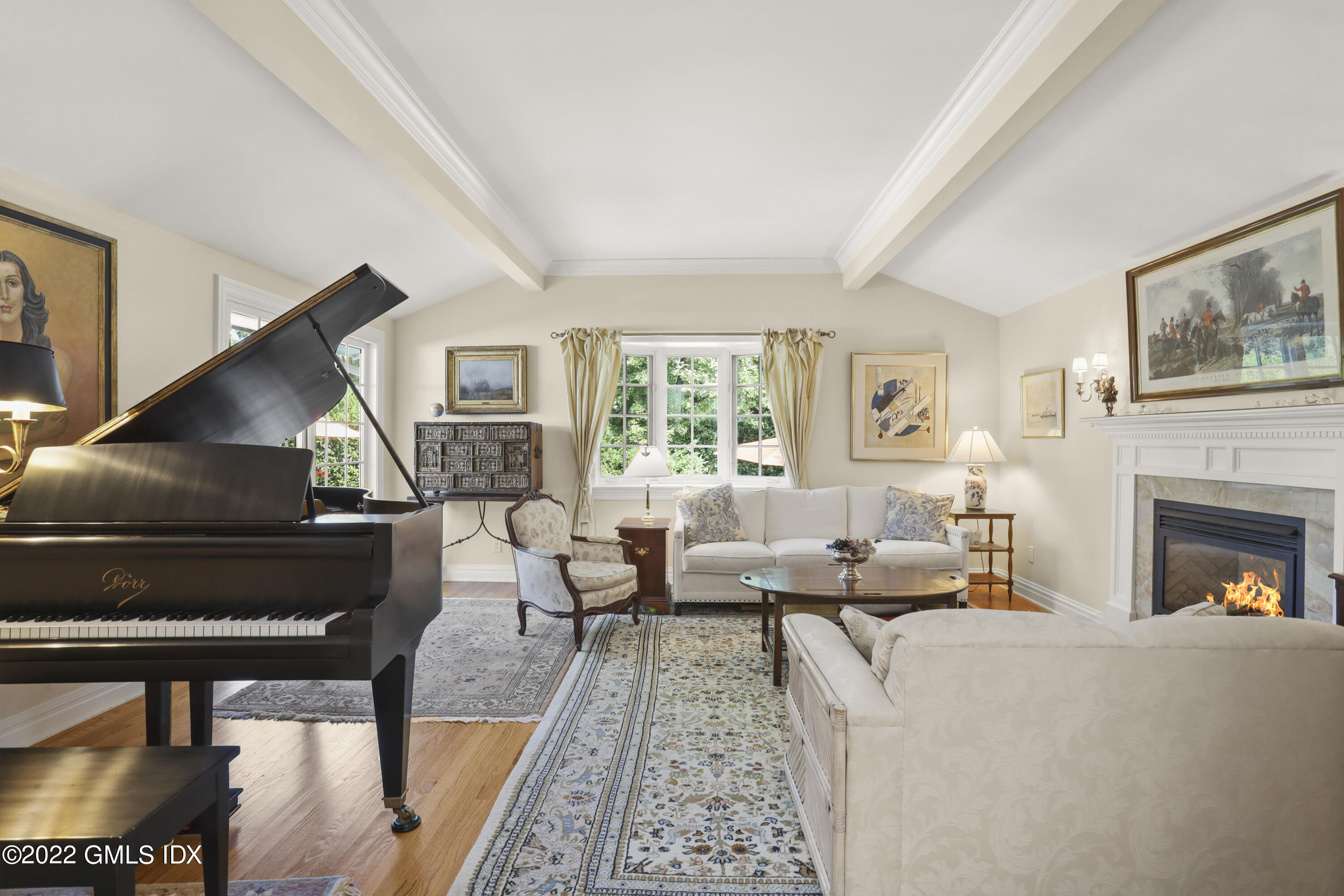 90 Carter Drive Stamford, CT 06902 - Photo 8 of 40 a living room with furniture and a fireplace