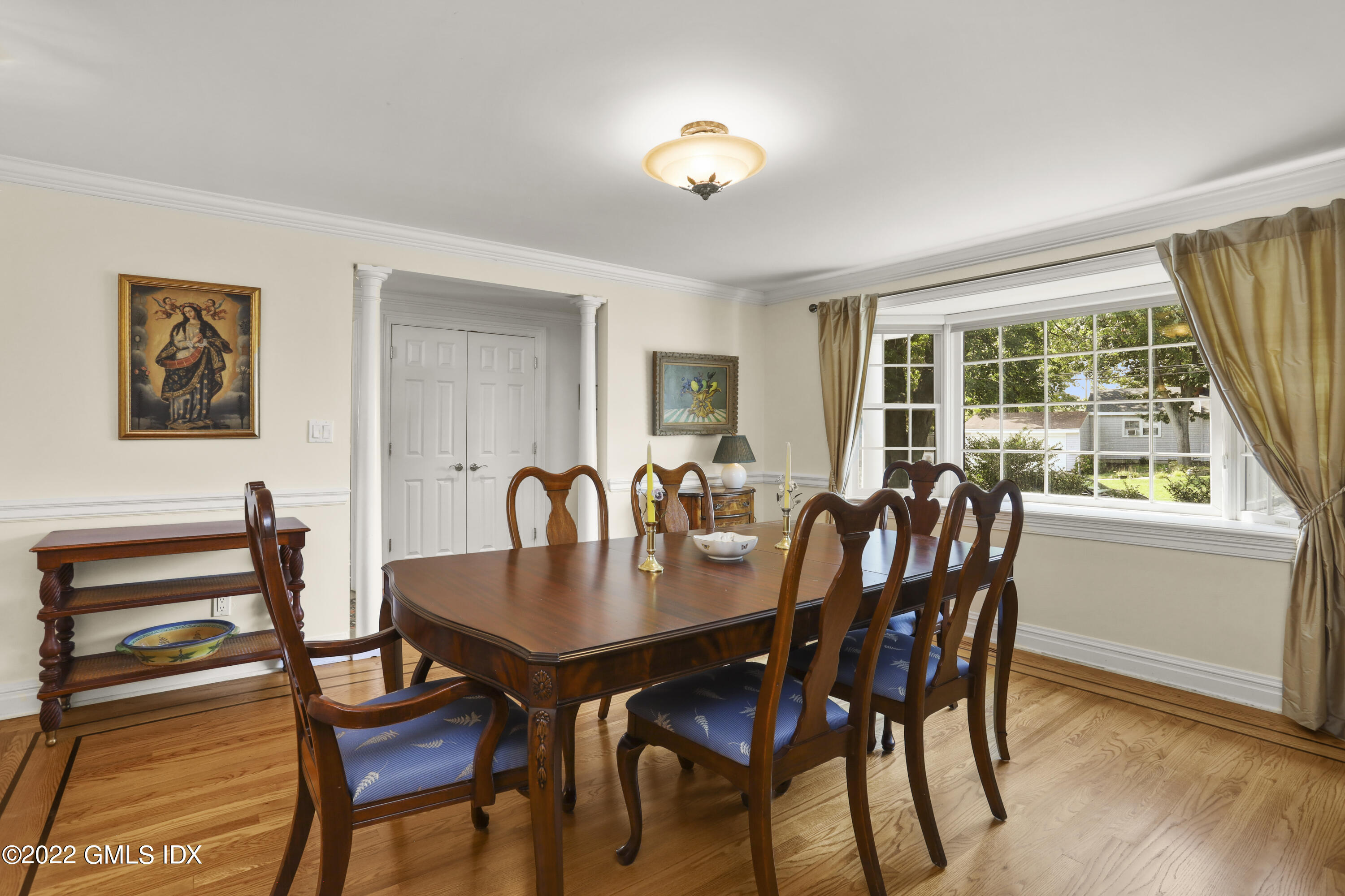 90 Carter Drive Stamford, CT 06902 - Photo 10 of 40 a view of a dining room with furniture and wooden floor