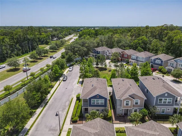 a view of a city with a building in the background