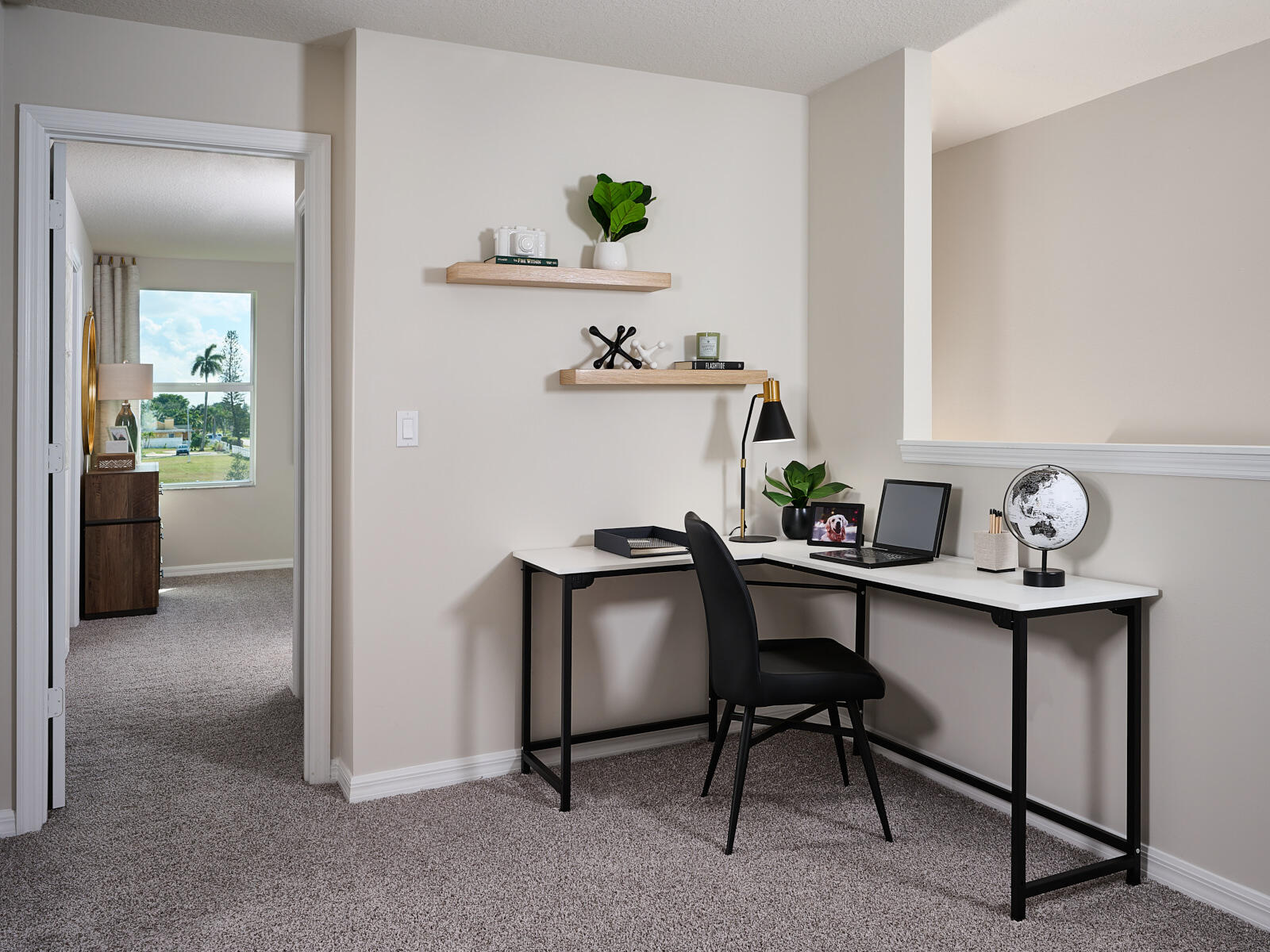 5658 Southeast Edgewater Circle Stuart, FL 34997 - Photo 6 of 8 a view of a workspace with furniture